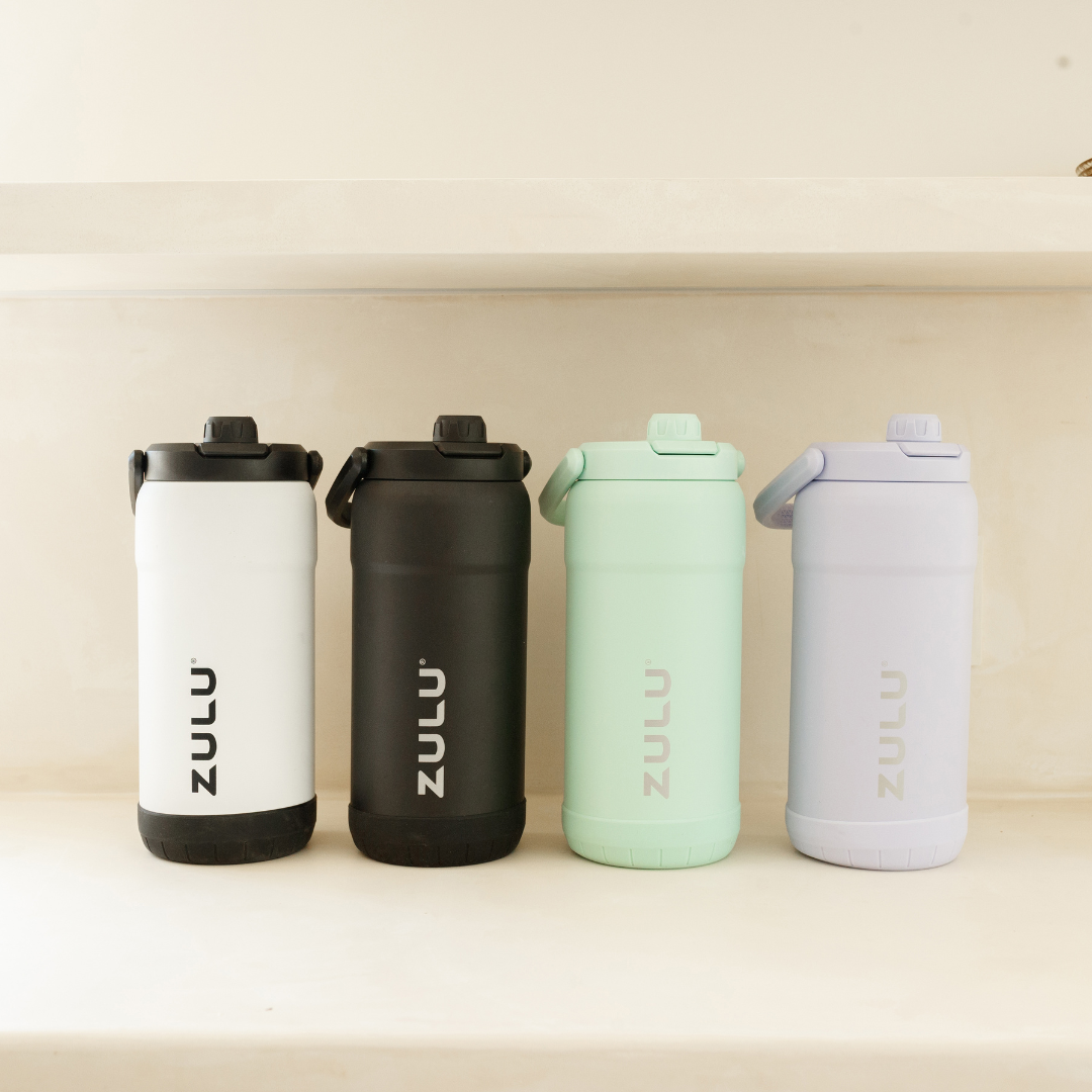 goals-mammoth-101oz-stainless-steel-bottle-i0 GoalsMammothAllColorsLifestyle.png